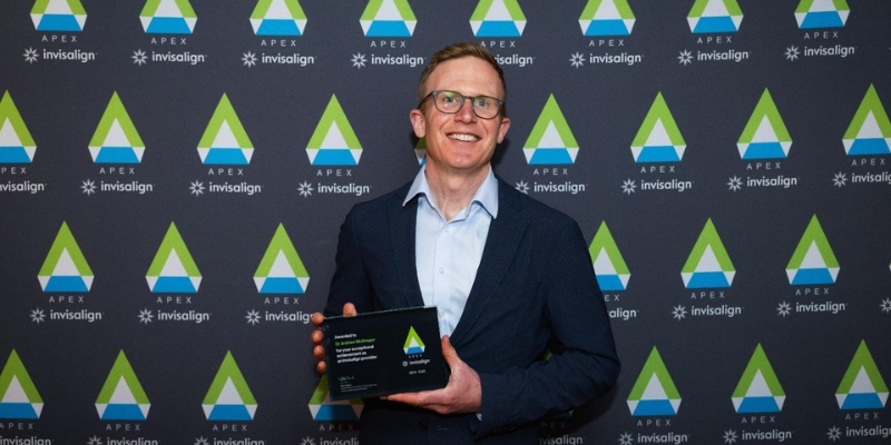 Dr Andrew McGregor with Award