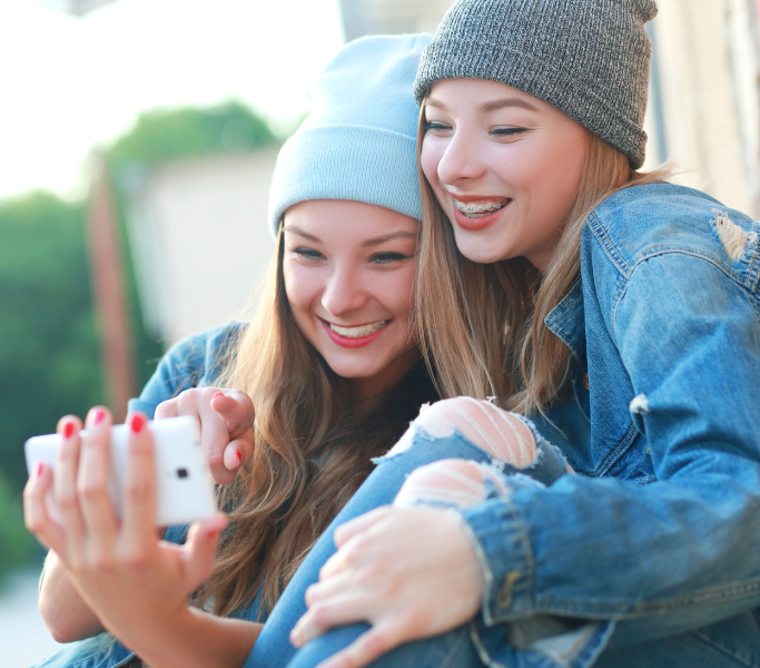 Two Teenagers wearing braces